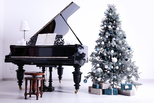 A piano sits without being used during the winter holiday season.